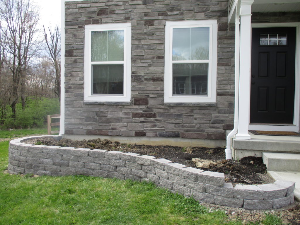 stone concrete retaining wall progress