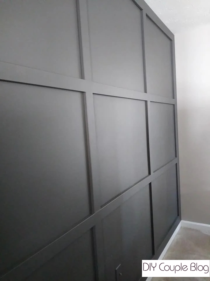 Painted a Moody DIY Grid Wall Sherwin Williams Urbane Bronze. 