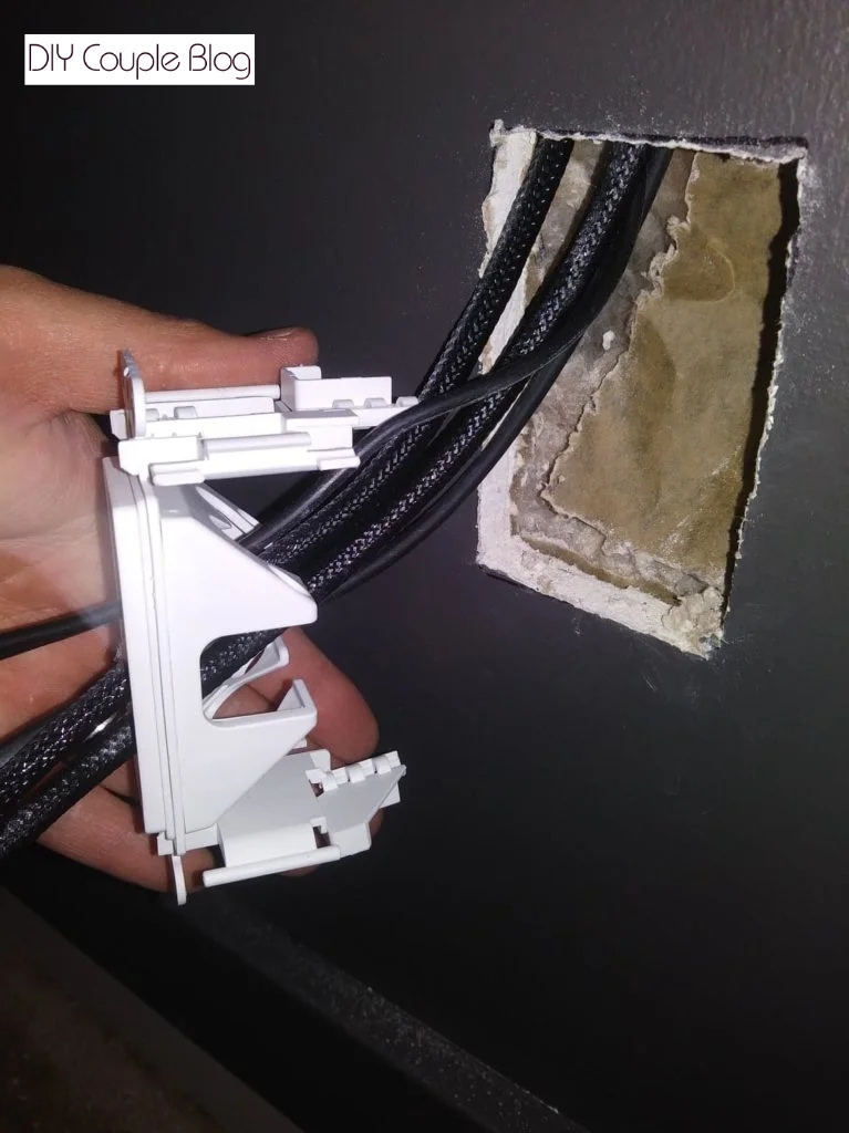 Feeding wires through the wall for a wall mount TV with no cords showing