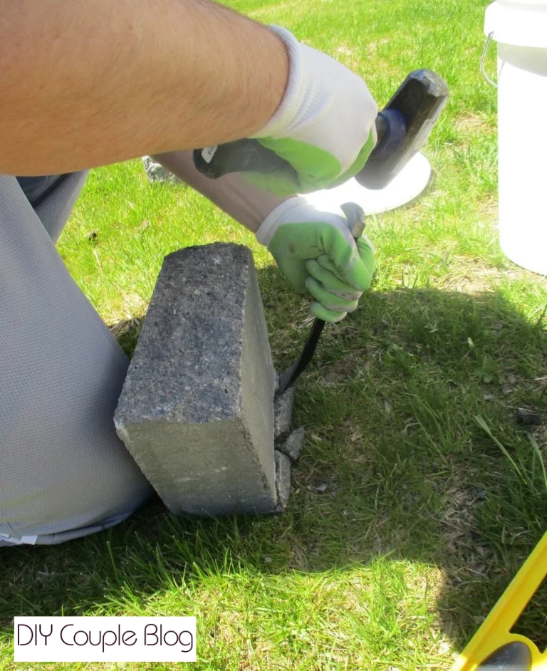 use a tool chisel to chisel the lip off the stone for retaining wall