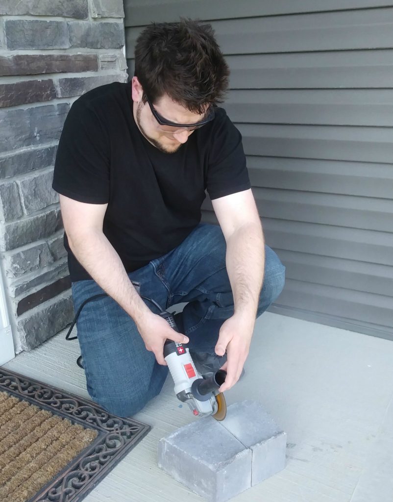 cutting retaining blocks with angle grinder and concrete blade