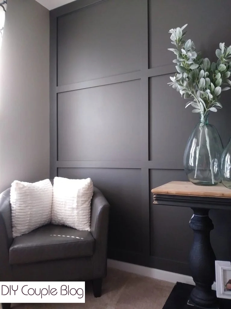 grid board and batten accent wall in a modern farmhouse living room