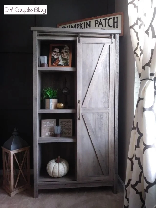 matching bookshelf hiding books and movies for a clean look