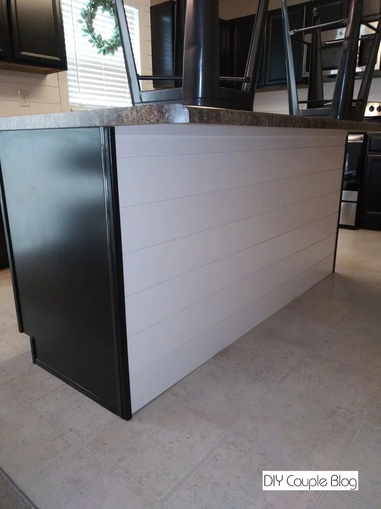 Modern farmhouse kitchen island with shiplap installed for an easy kitchen makeover 