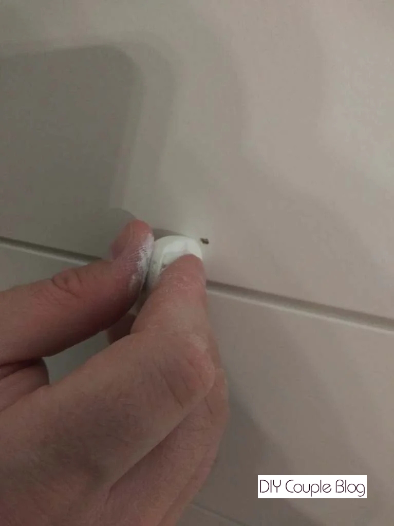 showing a nail hole that needs covered up