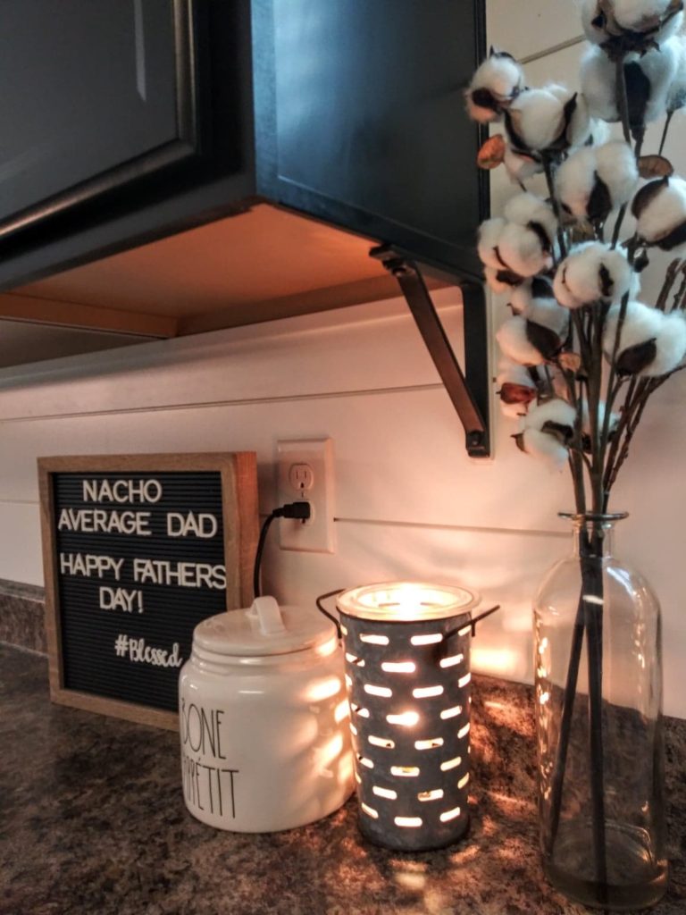 farmhouse kitchen with shiplap backsplash