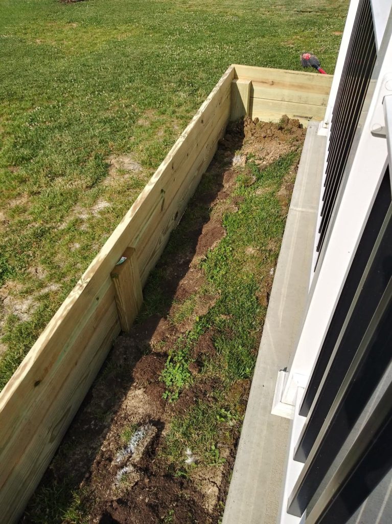 diy wood flower bed base off patio