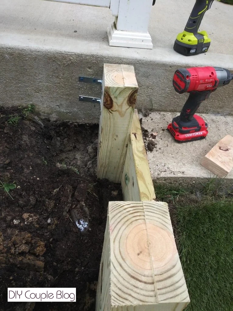 bracing the other post end to the concrete patio