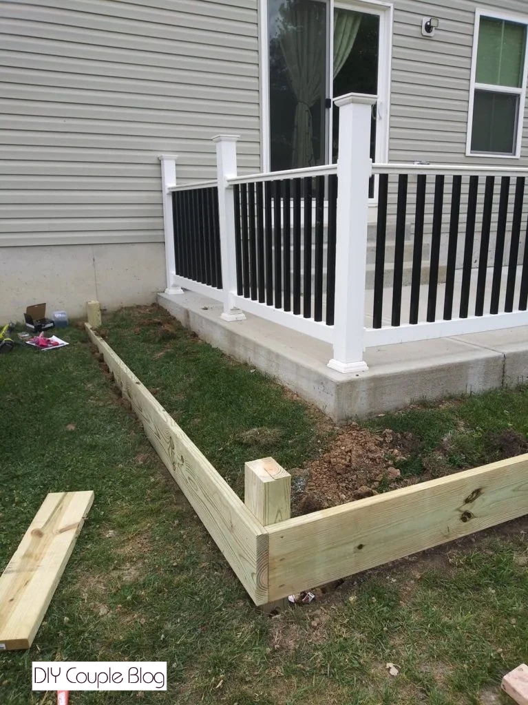assembling the corners of a DIY lumber garden box