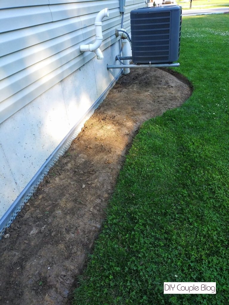 edging out a nice design to start our air conditioner landscaping