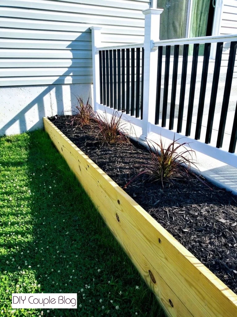 step-by-step assembly of a wooden raised garden bed