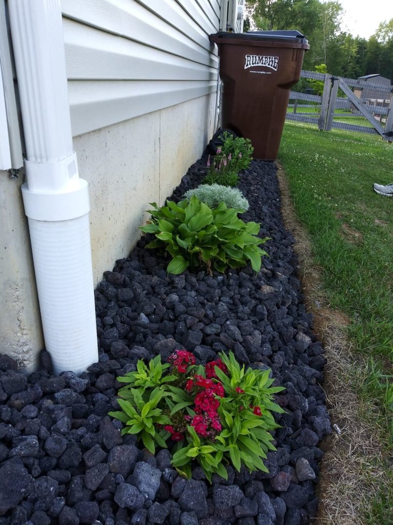 FLOWER BED IDEAS WITH BLACK LAVA ROCK