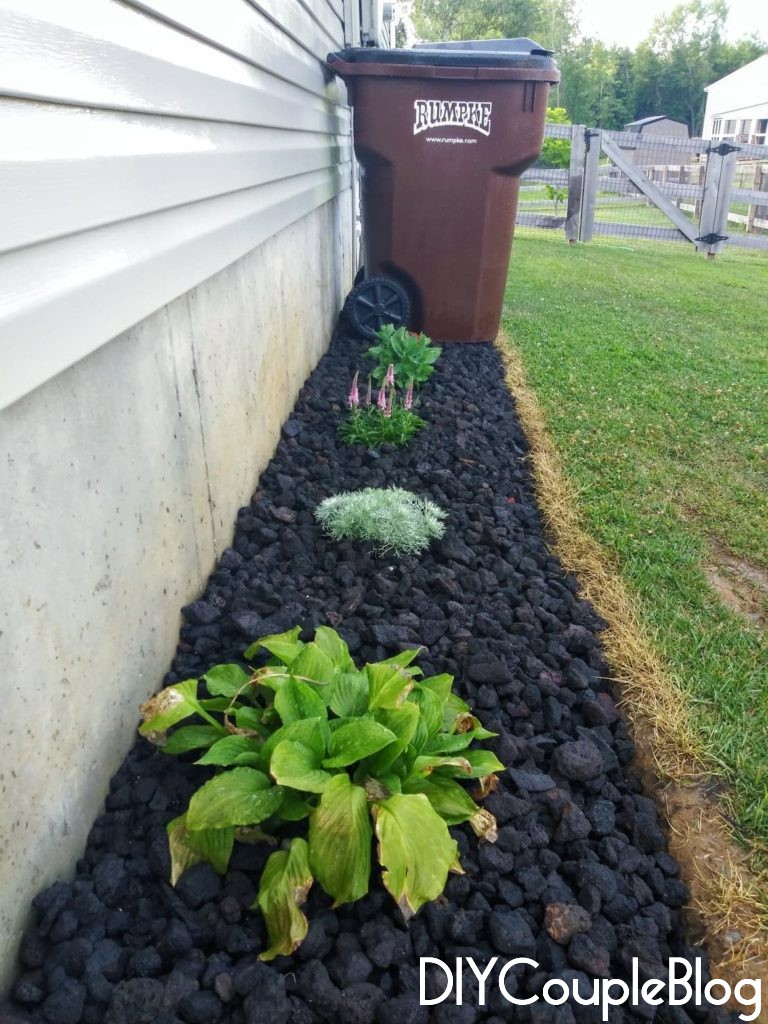 landscaping with lava rocks on the side of the house to boost curb appeal