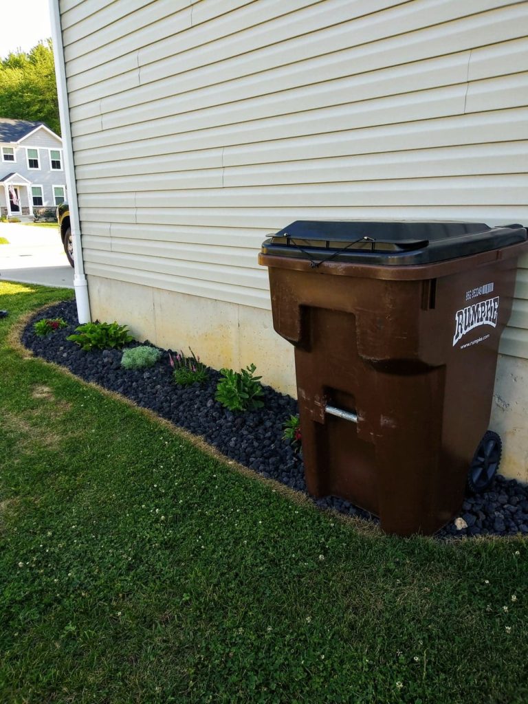 side of garage landscaping