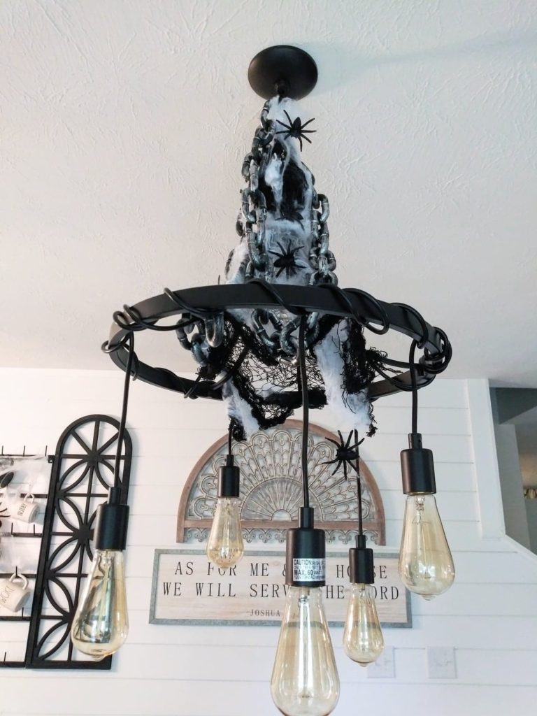 picture of creepy chandelier when finished decorating