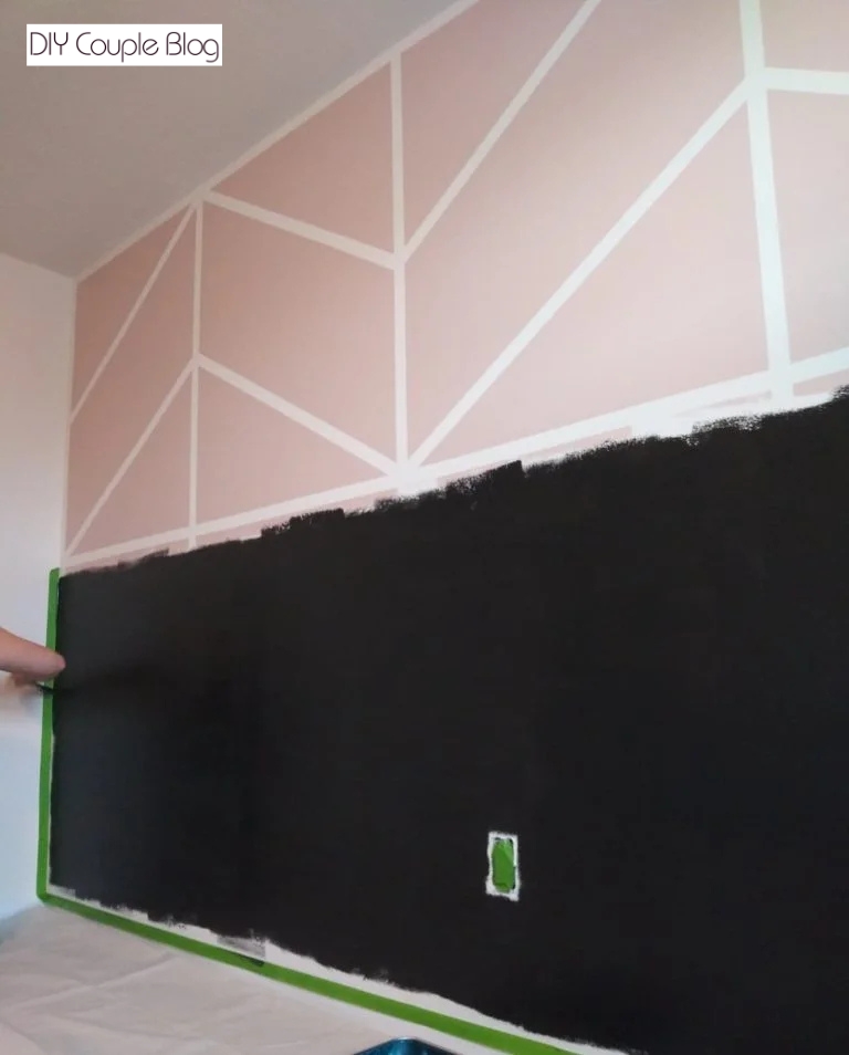 pink and black nursery accent wall