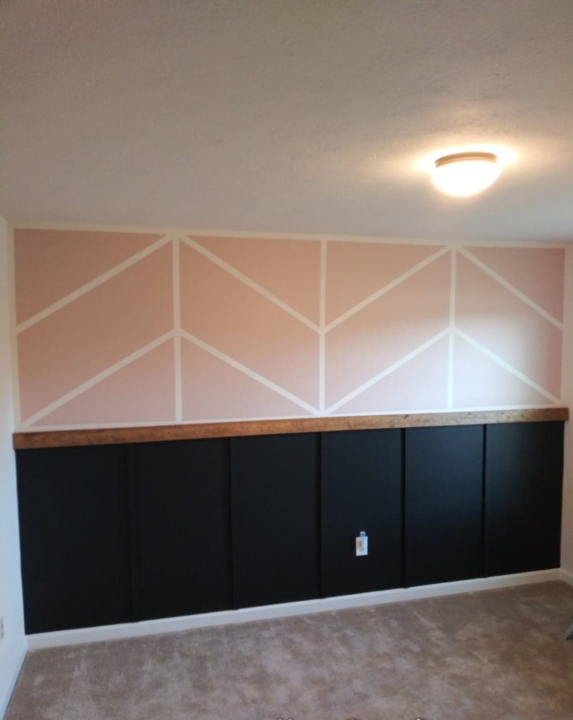 herringbone wall-nursery accent wall with pink and black paint colors