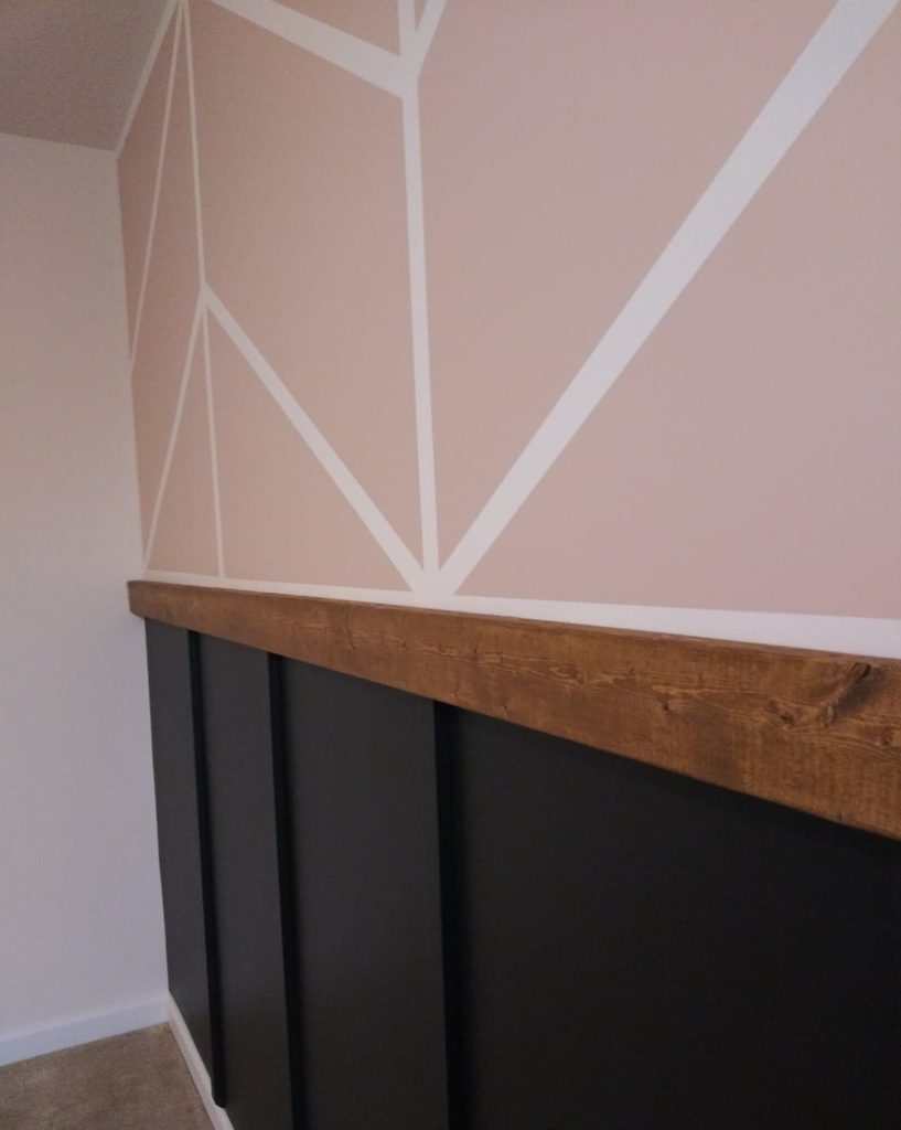 pink shadow sherwin williams herringbone wall with black board and batten wall on bottom