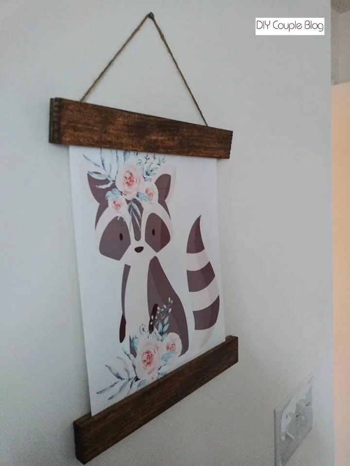 cheap nursery decor featuring watercolor blush florals and forest raccoon animal