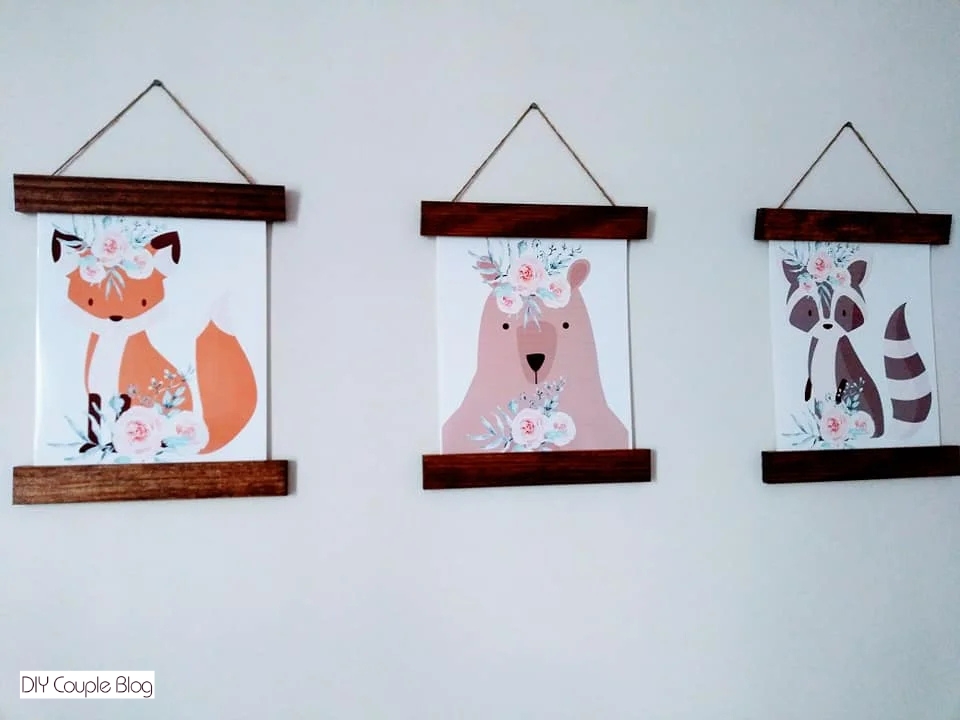completed woodland prints for nursery hung on the wall