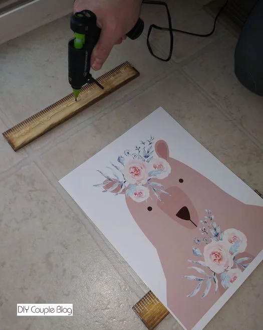 applying hot glue to attach to printable