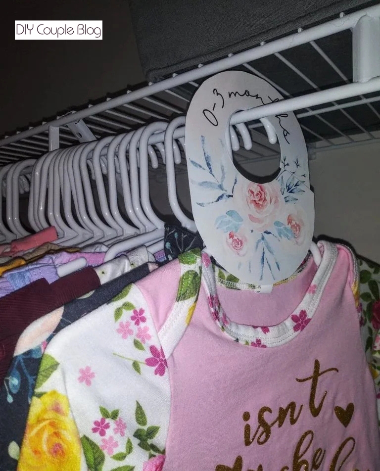 nursery closet organization with hanging size dividers