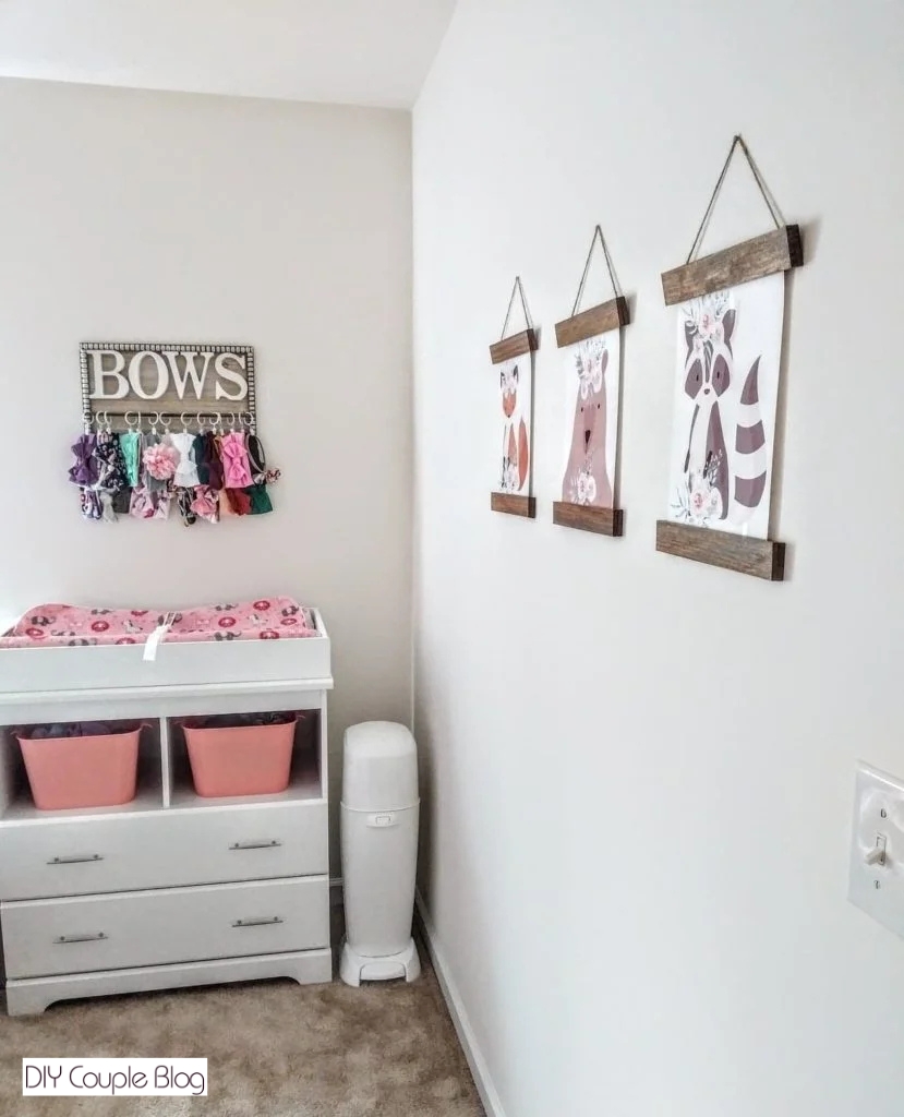 woodland nursery decor hanging on a girl's nursery wall