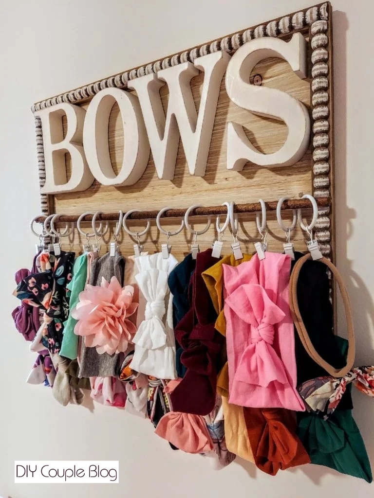 handmade wooden headband organizer hanging as functional wall decor