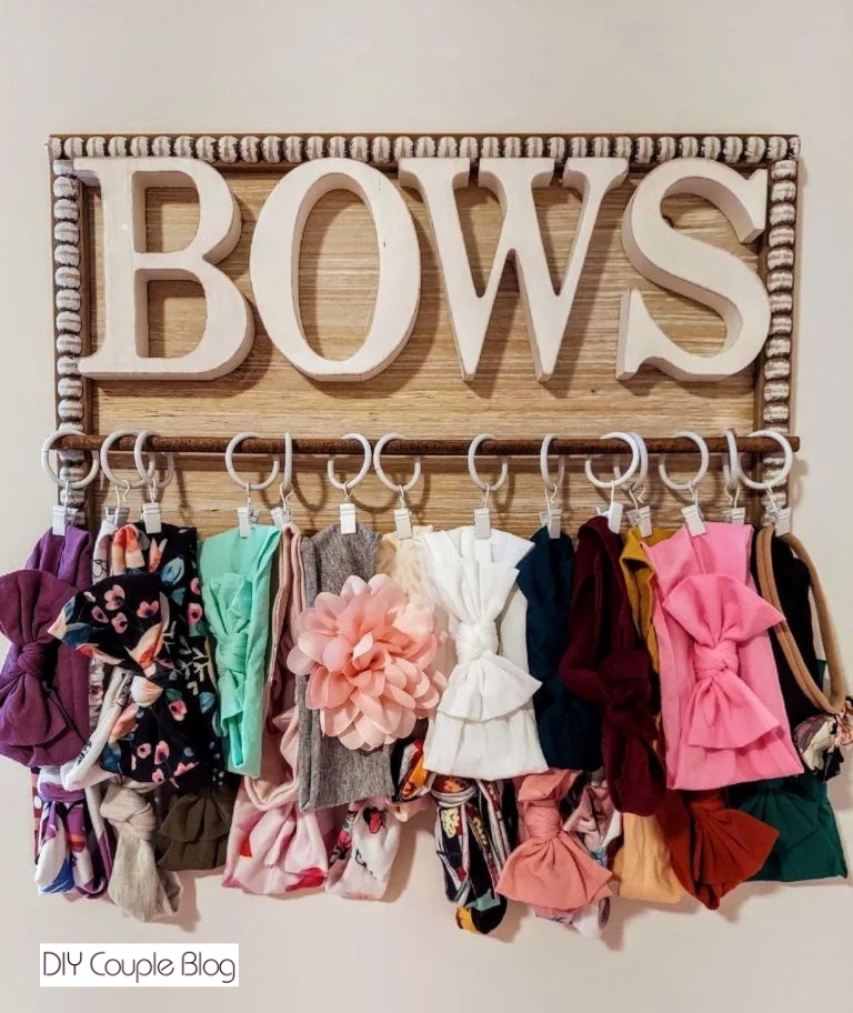 wall-mounted DIY headband holder filled with colorful headbands