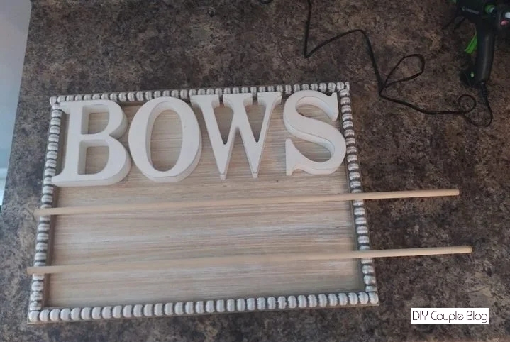 laying out and choosing placement of the DIY headband holder sign