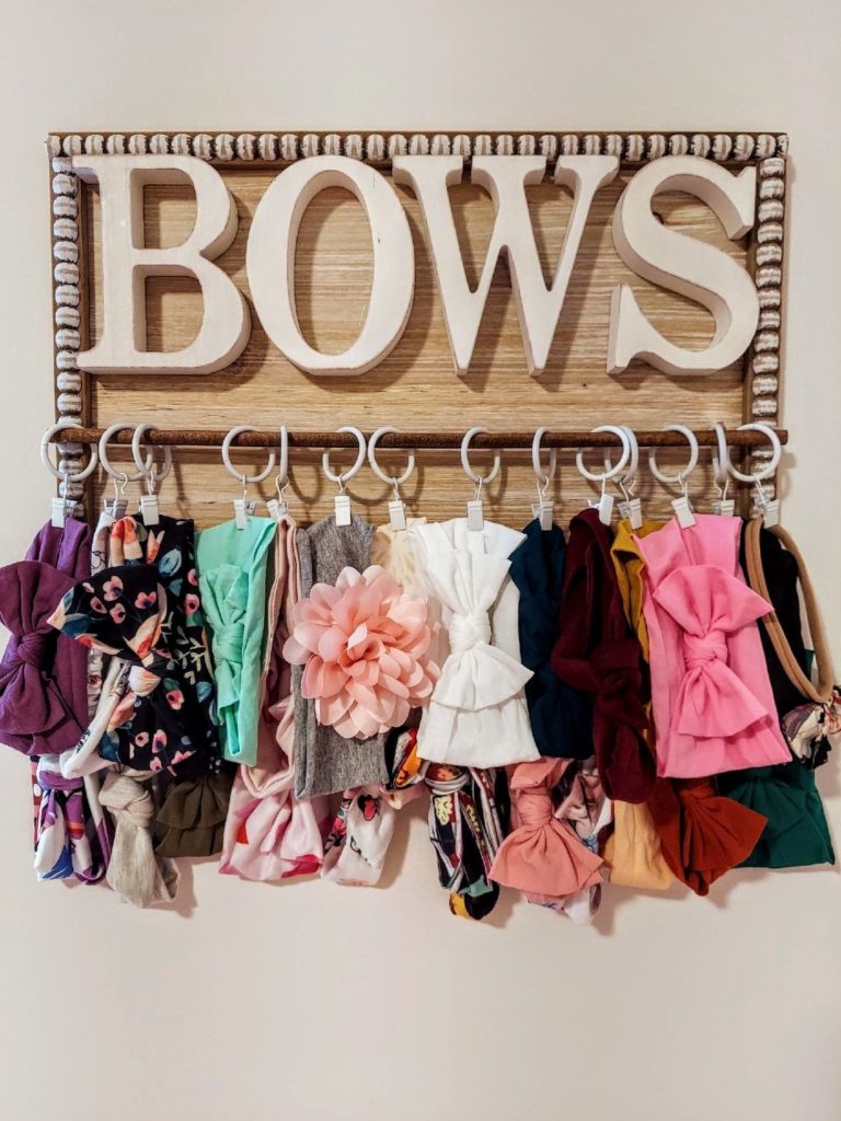 bow holder with all her hairbows 