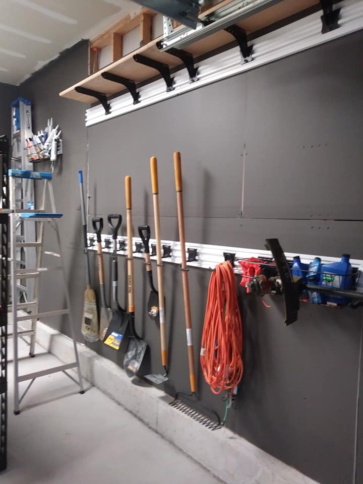 garage wall ideas with track for yard tools