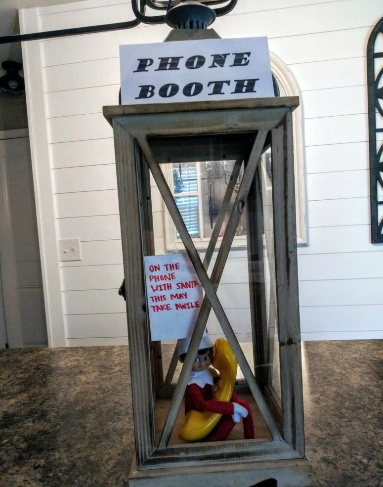 elf on the shelf phone booth, he's talking to Santa!
