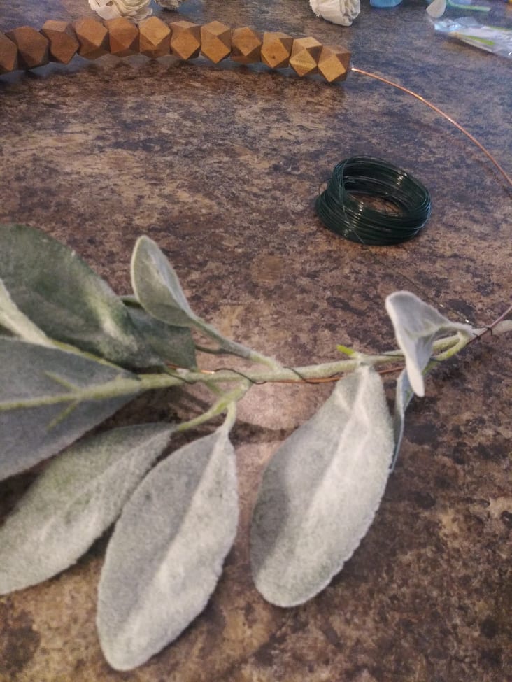 wrapping wire around lambs ear to secure to hoop