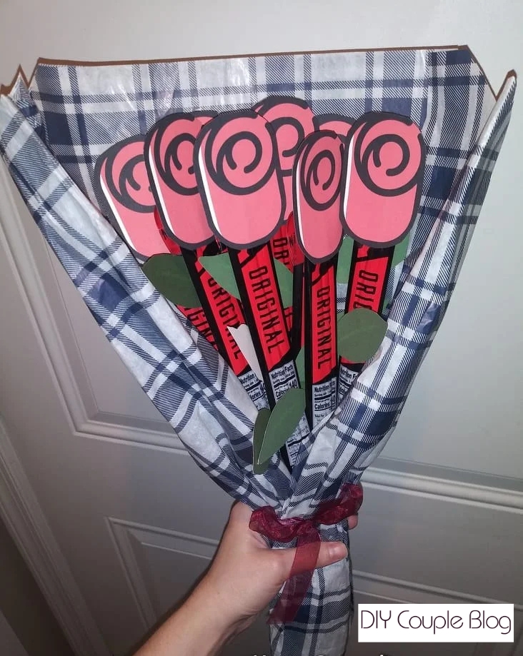 A manly bouquet made with a free printable template and beef jerky sticks for stems
