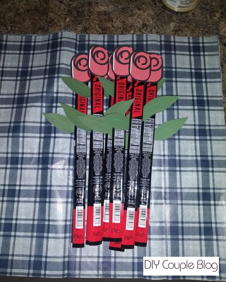 A Father's Day or Valentine's Day beef jerky bouquet gift idea awaiting gift tissue paper
