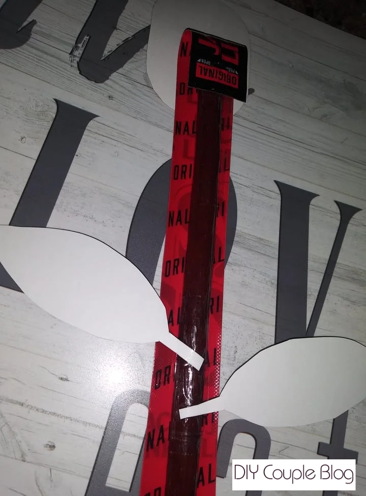 a look at the back after adding free printable rose and leaves to the beef jerky gift idea for him.