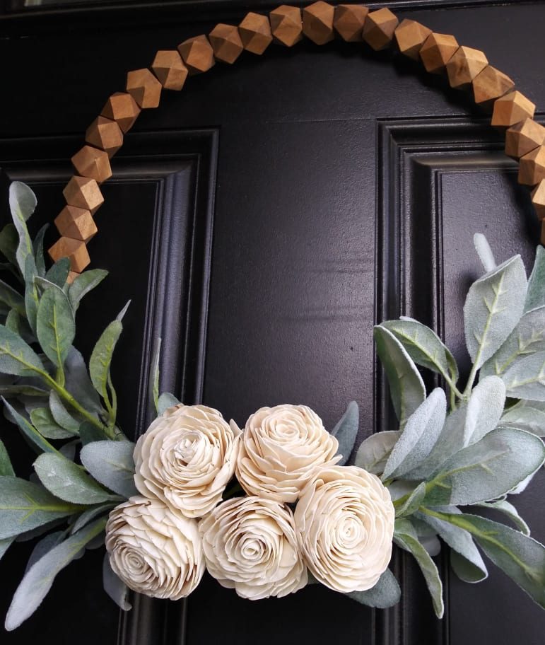 wreath on black front door