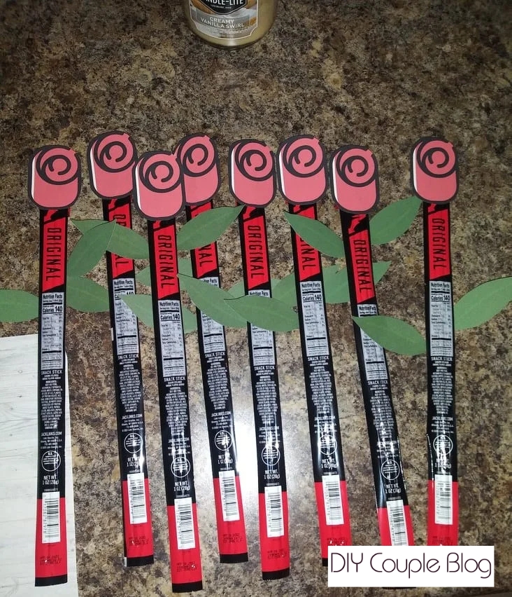 Several completed roses before crafting a beef jerky bouquet