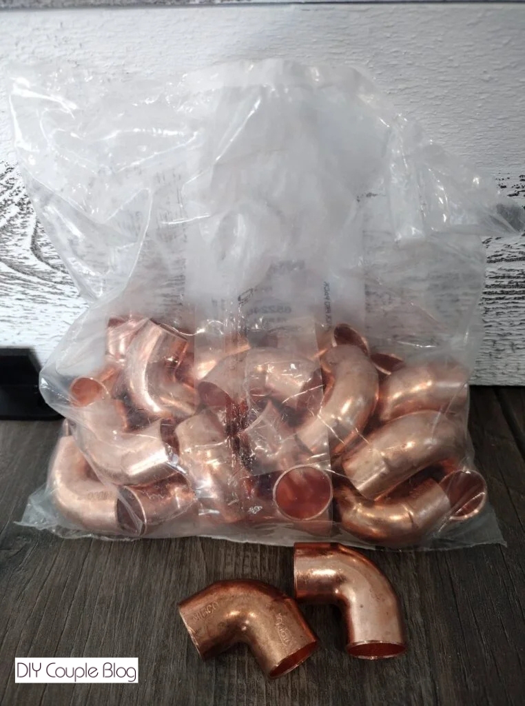 copper elbow to put on the pumpkin stem for a vintage look