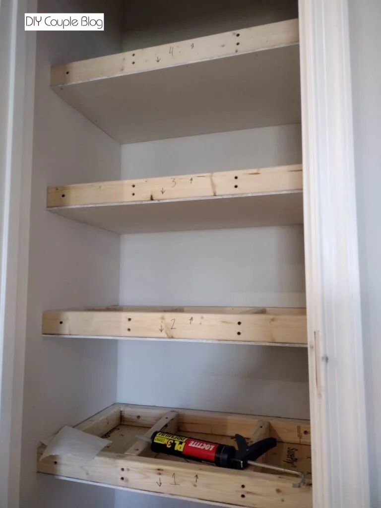 the process of building DIY pantry shelving