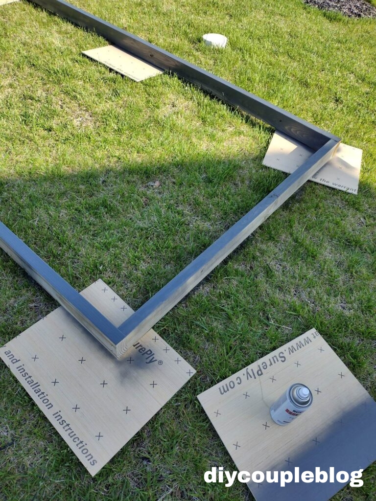 painting frame for a dark gray privacy wall