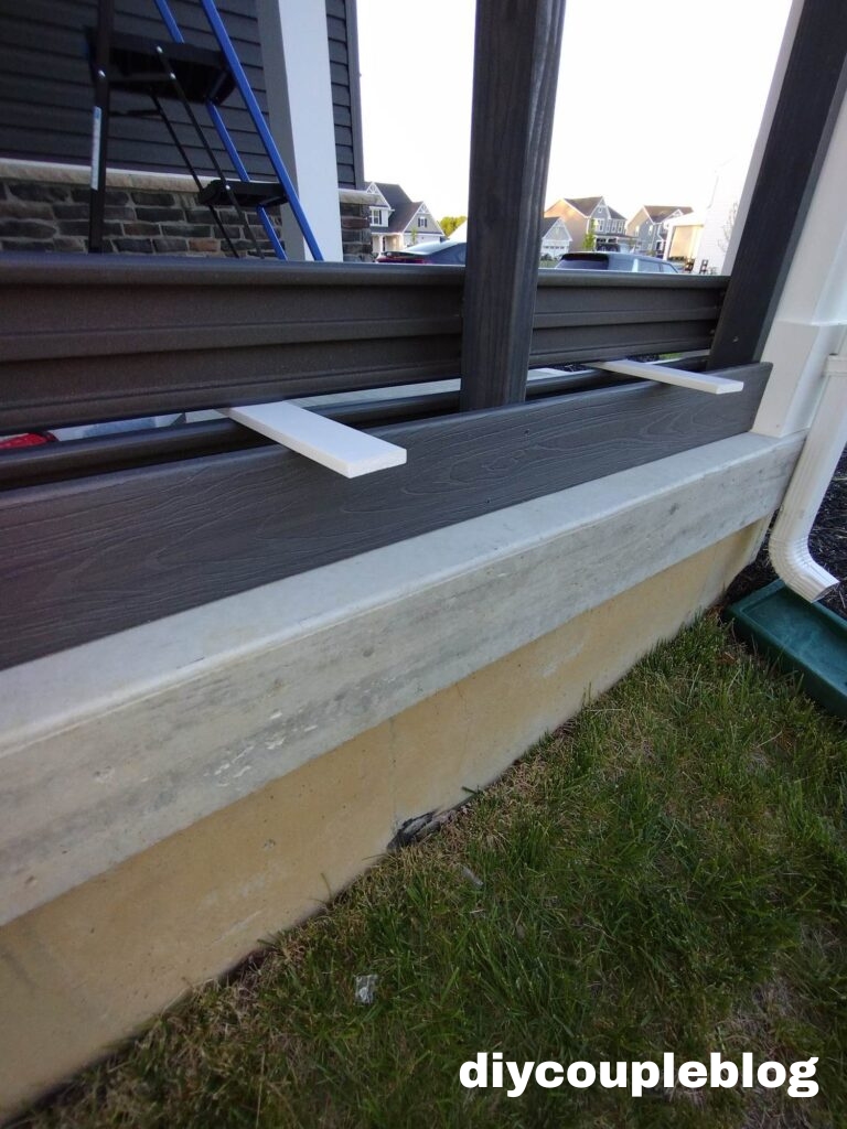 Horizontal composite decking boards creating a stylish privacy barrier