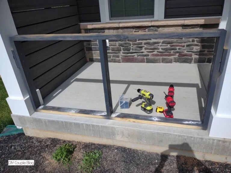 completed frame attached between the front porch posts 