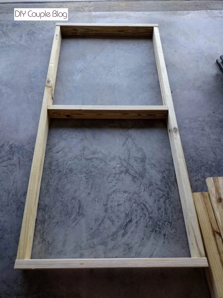 frame of outdoor railing laid out and being assembled 