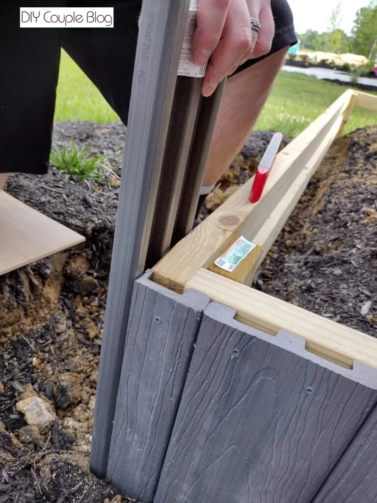 the process of building a tree planter box with decking boards 