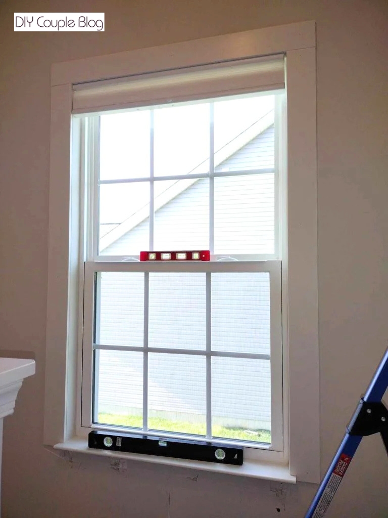 trim installed around the whole window frame on our accent stair wall