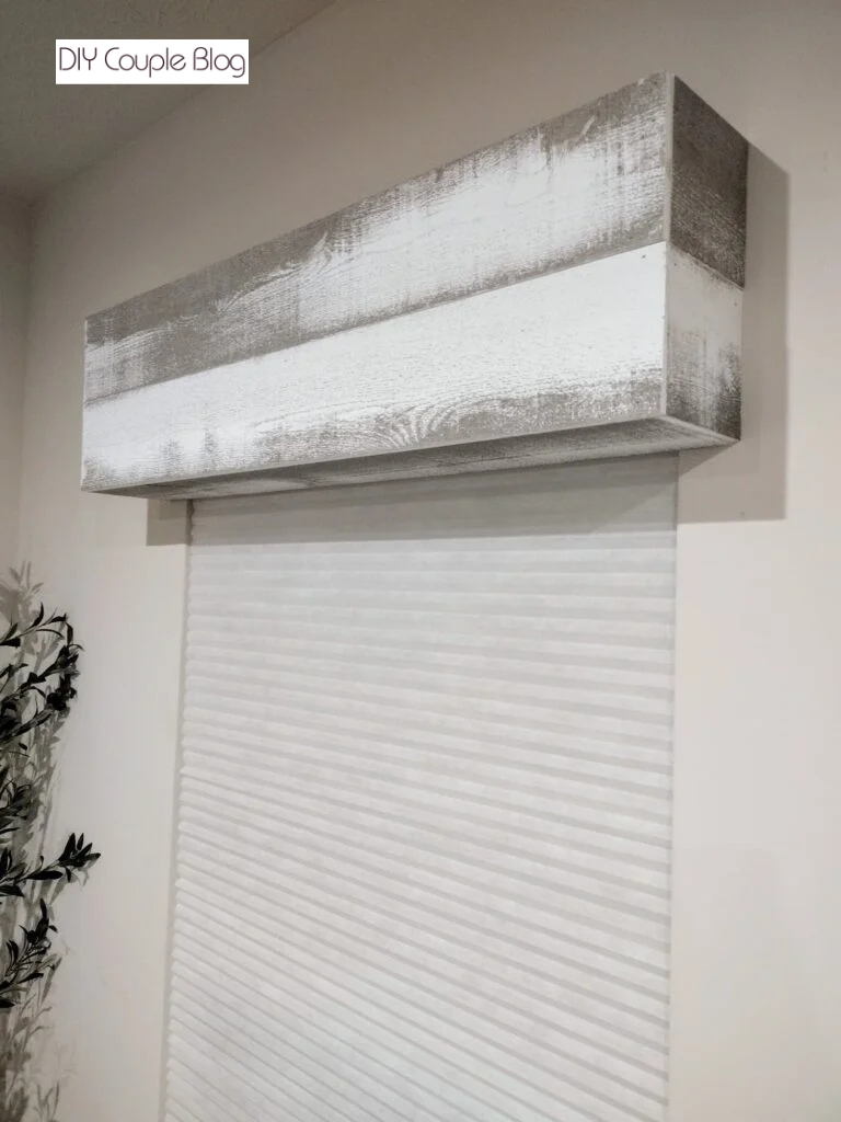 DIY wood window cornice with whitewashed barnwood planks