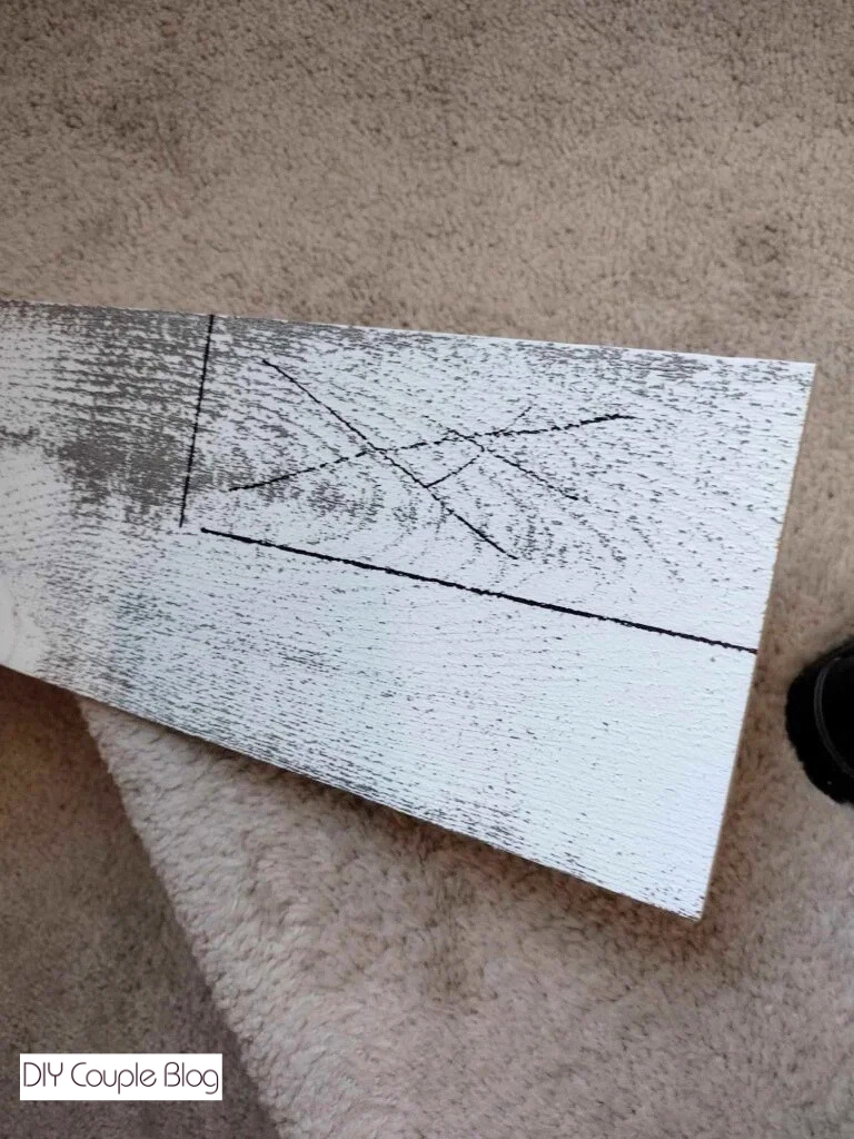 showing the mark where we plan to cut the wood