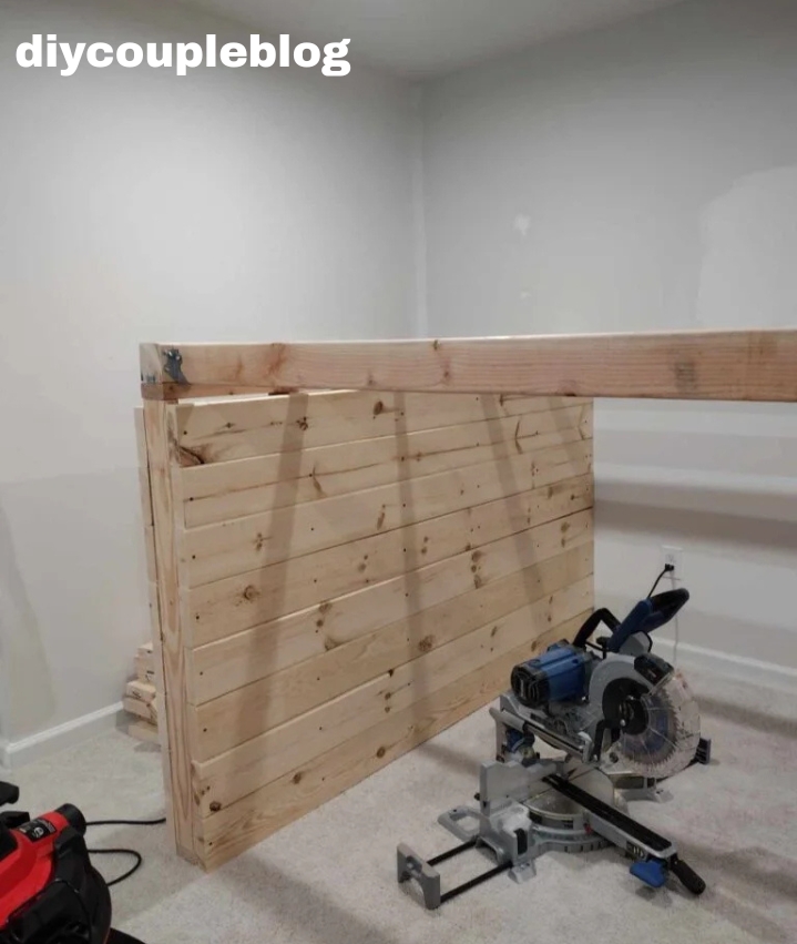 attaching boards to the inside of support walls